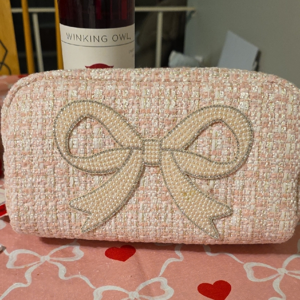 Elegant Pink Tweed Clutch with Bow Accent